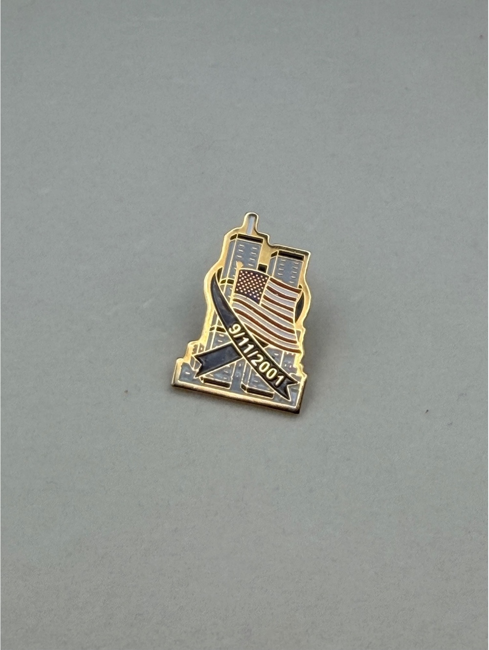Enamel building and flag lapel pin
